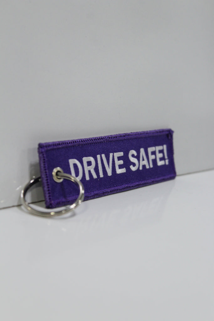 Drive Safe! Jet Tag (Purple) Justillicit.